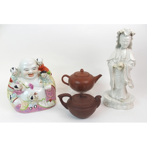 61 - A CHINESE BLANC DE CHINE MODEL OF GUANYIN