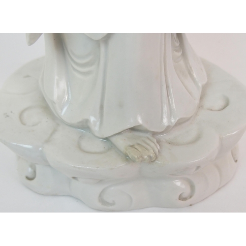 61 - A CHINESE BLANC DE CHINE MODEL OF GUANYIN