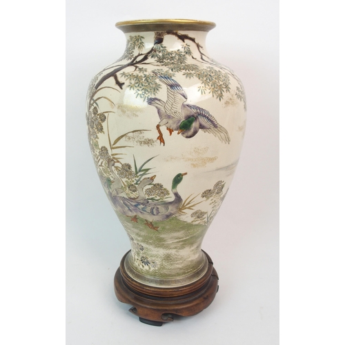 67 - A SATSUMA BALUSTER VASE