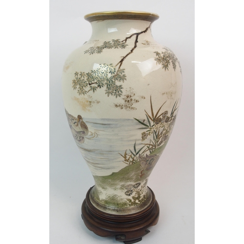 67 - A SATSUMA BALUSTER VASE