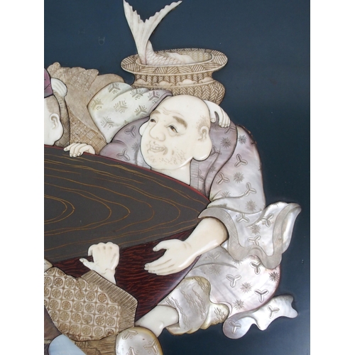 75 - A JAPANESE LACQUERED  IVORY AND SHELL PLAQUE