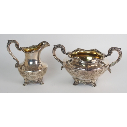 151 - A PAIR OF GERMAN SILVER MOUNTED CUT GLASS CLARET JUGS