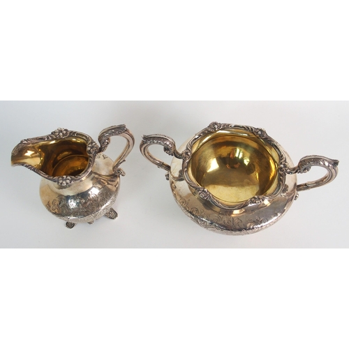 151 - A PAIR OF GERMAN SILVER MOUNTED CUT GLASS CLARET JUGS