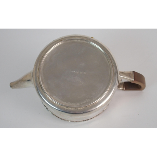 153 - A SILVER HOT MILK JUG