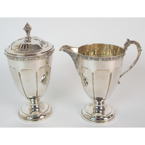 212 - A FOUR PIECE SILVER TEA SERVICE