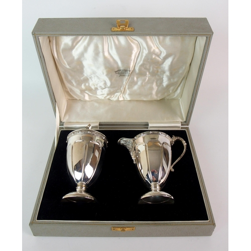 212 - A FOUR PIECE SILVER TEA SERVICE