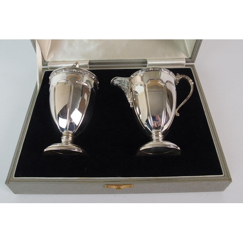 212 - A FOUR PIECE SILVER TEA SERVICE