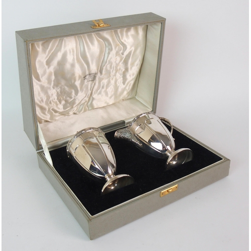 212 - A FOUR PIECE SILVER TEA SERVICE