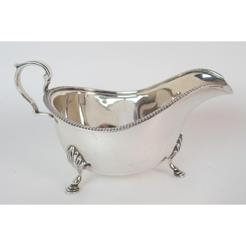 216 - A CASED PAIR OF SILVER BUTTER DISHES