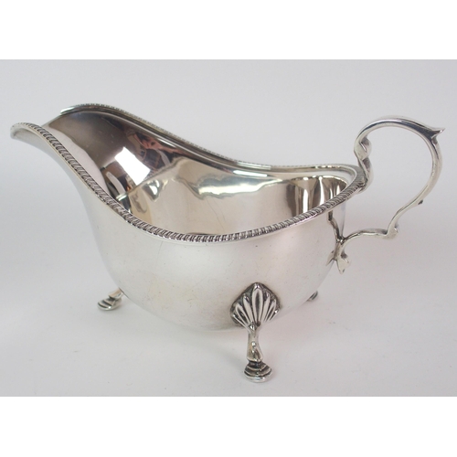 216 - A CASED PAIR OF SILVER BUTTER DISHES