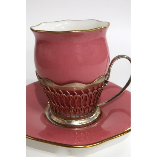 105 - A BOXED SET OF SIX PINK AND GILT COALPORT COFFEE CUPS AND SAUCERS