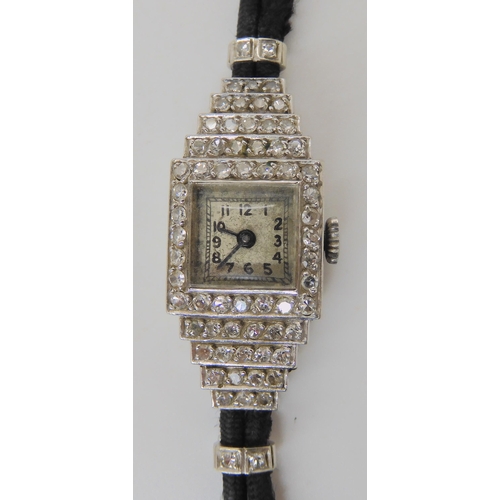 72 - A PLATINUM AND DIAMOND VERTEX COCKTAIL WATCH