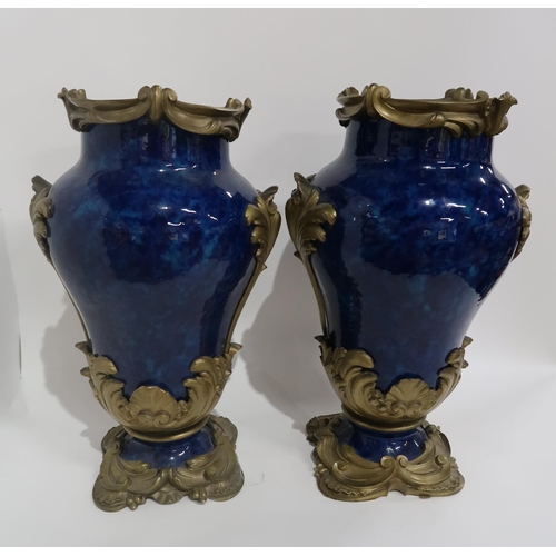 79 - A PAIR OF FRENCH BLUE GLAZED AND GILT METAL MOUNTED VASES