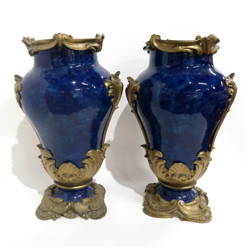 79 - A PAIR OF FRENCH BLUE GLAZED AND GILT METAL MOUNTED VASES