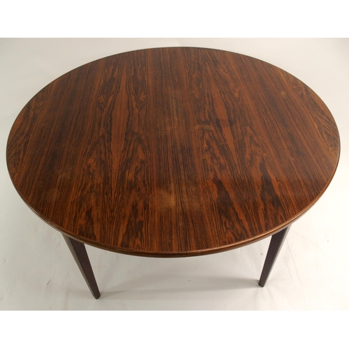 1120 - AN OMANN JUN A/S MODEL NO. 55 ROSEWOOD EXTENDING DINING TABLE