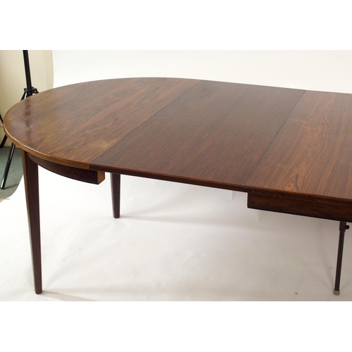 1120 - AN OMANN JUN A/S MODEL NO. 55 ROSEWOOD EXTENDING DINING TABLE