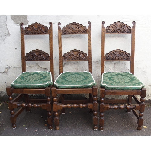 1122 - A SET OF TWELVE NIGEL GRIFFITHS OAK DINING CHAIRS