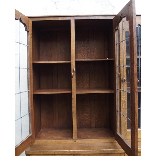 1123 - A PAIR OF NIGEL GRIFFITHS OAK BOOKCASES