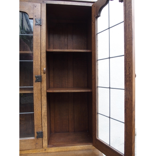 1123 - A PAIR OF NIGEL GRIFFITHS OAK BOOKCASES