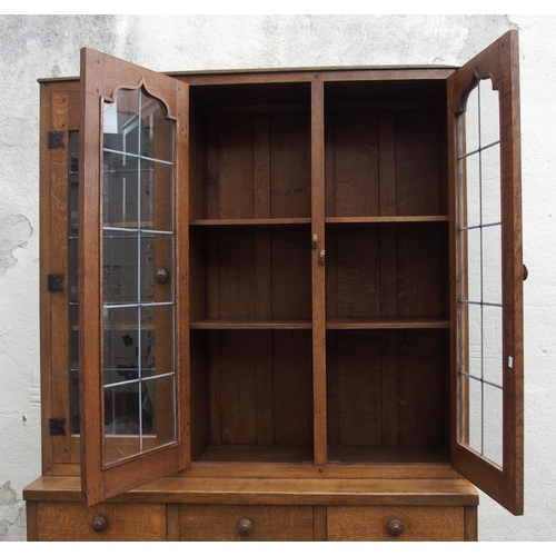 1123 - A PAIR OF NIGEL GRIFFITHS OAK BOOKCASES