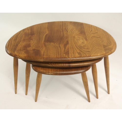 1130 - A NEST OF THREE LIGHT ELM ERCOL PEBBLE TABLES