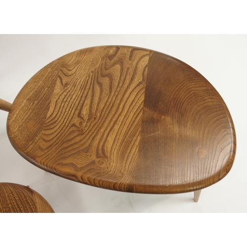 1130 - A NEST OF THREE LIGHT ELM ERCOL PEBBLE TABLES