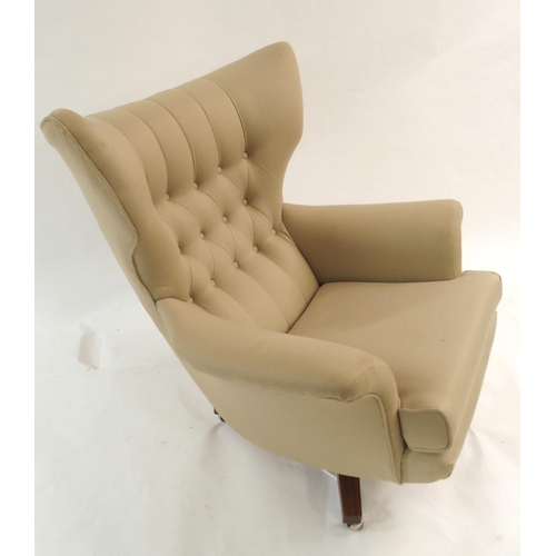 1137 - A G-PLAN BUTTON BACK SWIVEL ARMCHAIR