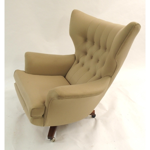 1137 - A G-PLAN BUTTON BACK SWIVEL ARMCHAIR