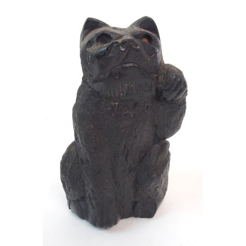 114 - A CHINESE COAL CARVING OF A CAT