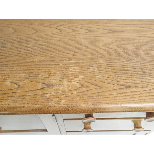 1140 - AN ERCOL SIDEBOARD