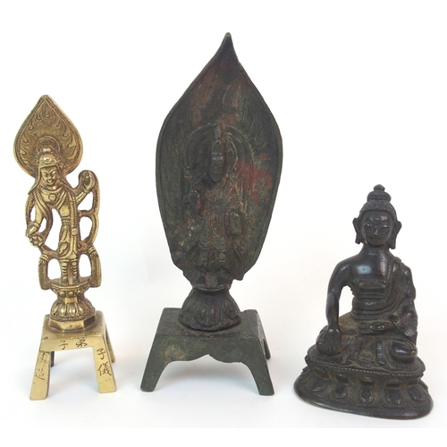 118 - A CHINESE BRONZE MODEL OF BUDDHA ON LOTUS THRONE