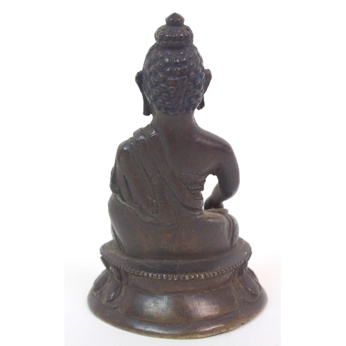 118 - A CHINESE BRONZE MODEL OF BUDDHA ON LOTUS THRONE