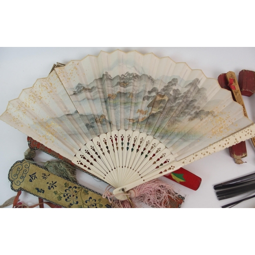 121 - NINE VARIOUS FANS IN SILK  PAPER AND LACQUER