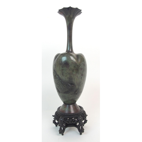 138 - A CHINESE BRONZE LOBED BALUSTER VASE