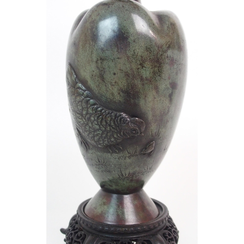 138 - A CHINESE BRONZE LOBED BALUSTER VASE