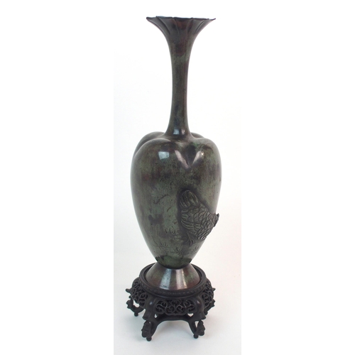 138 - A CHINESE BRONZE LOBED BALUSTER VASE