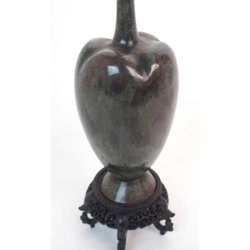 138 - A CHINESE BRONZE LOBED BALUSTER VASE