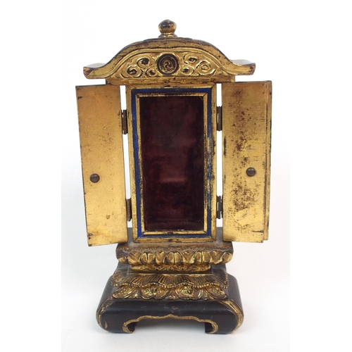 140 - A BLACK AND GILT LACQUERED TABLE SHRINE