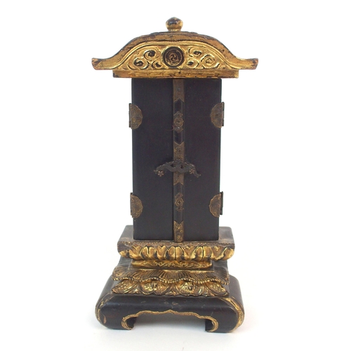 140 - A BLACK AND GILT LACQUERED TABLE SHRINE