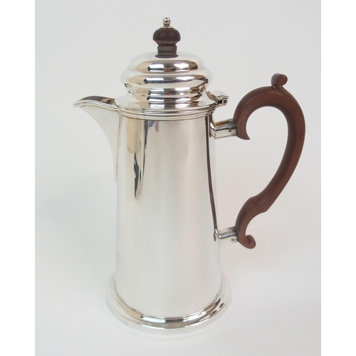 153 - A SILVER HOT MILK JUG