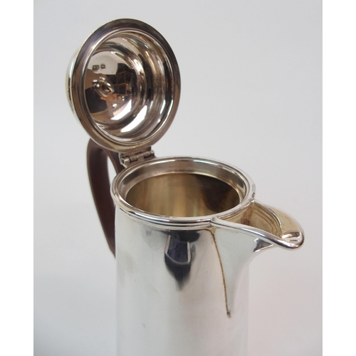 153 - A SILVER HOT MILK JUG