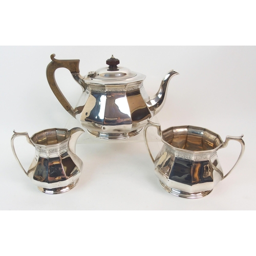 165 - A THREE-PIECE SILVER TEA SERVICE