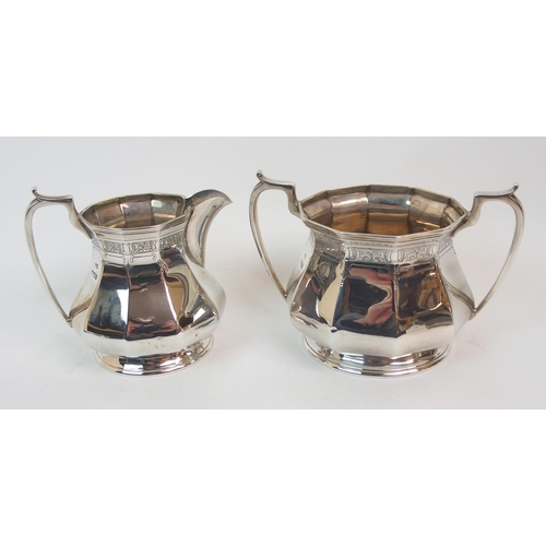 165 - A THREE-PIECE SILVER TEA SERVICE