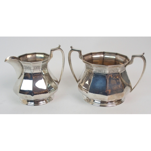 165 - A THREE-PIECE SILVER TEA SERVICE