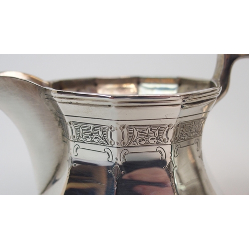 165 - A THREE-PIECE SILVER TEA SERVICE