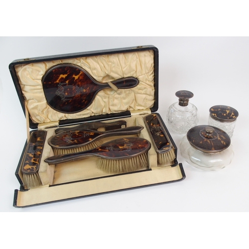 174 - A SIX-PIECE SILVER AND TORTOISESHELL DRESSING TABLE SET