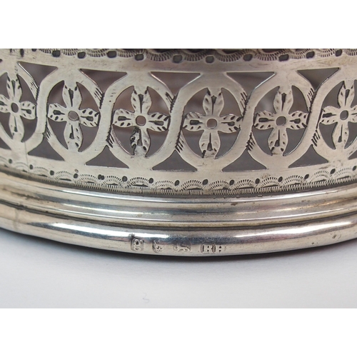 182 - AN 18TH CENTURY SILVER WINE COASTER