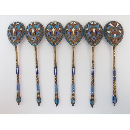 188 - A SET OF FIVE RUSSIAN SILVER GILT AND ENAMEL SPOONS