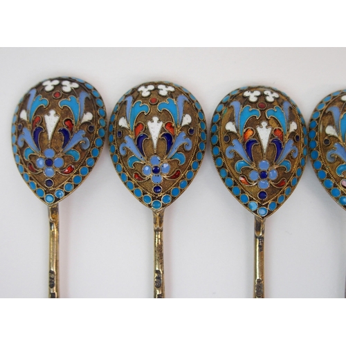 188 - A SET OF FIVE RUSSIAN SILVER GILT AND ENAMEL SPOONS