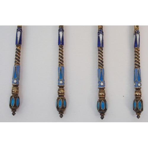 188 - A SET OF FIVE RUSSIAN SILVER GILT AND ENAMEL SPOONS